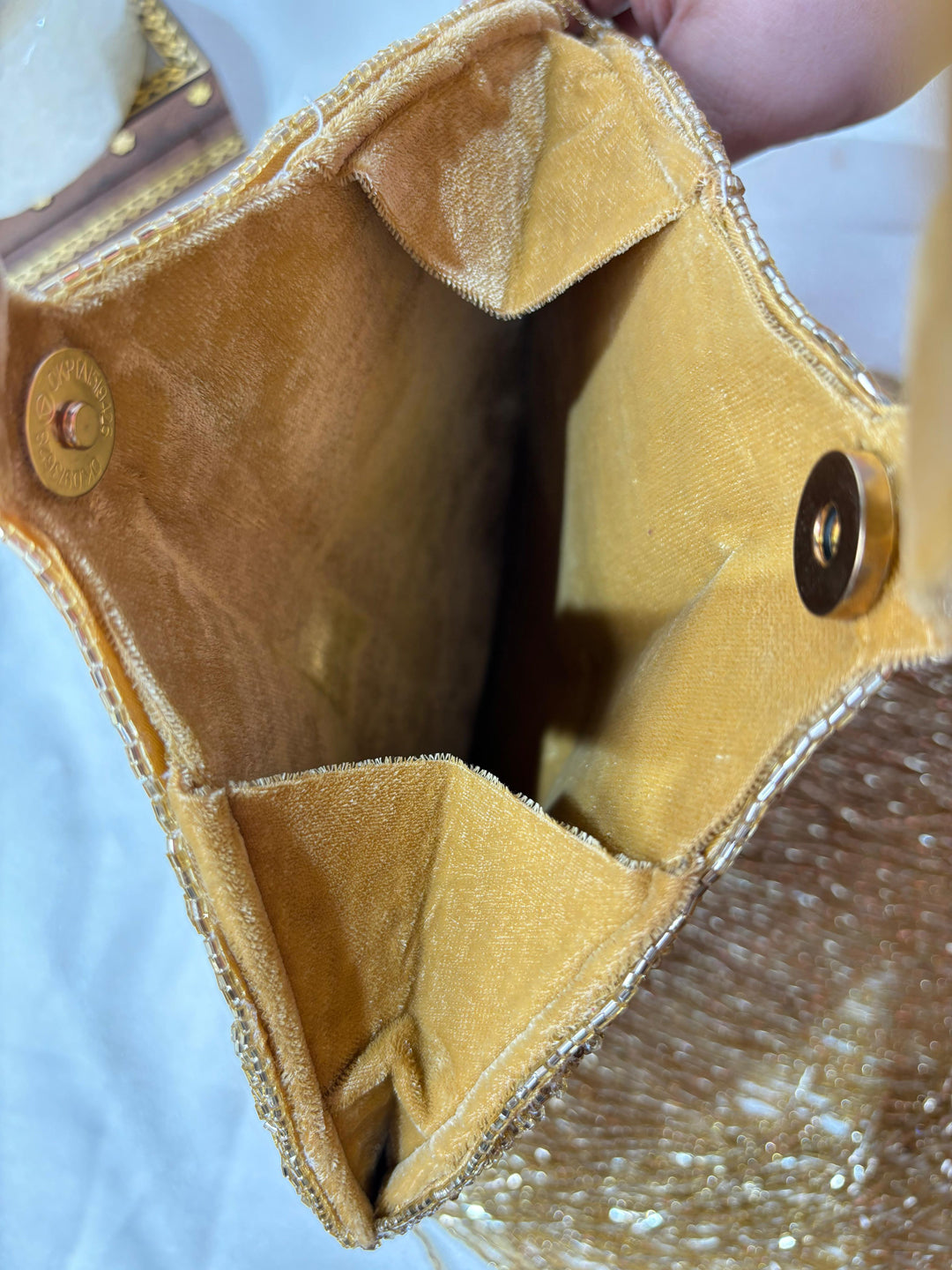 Designer gold pankha clutch