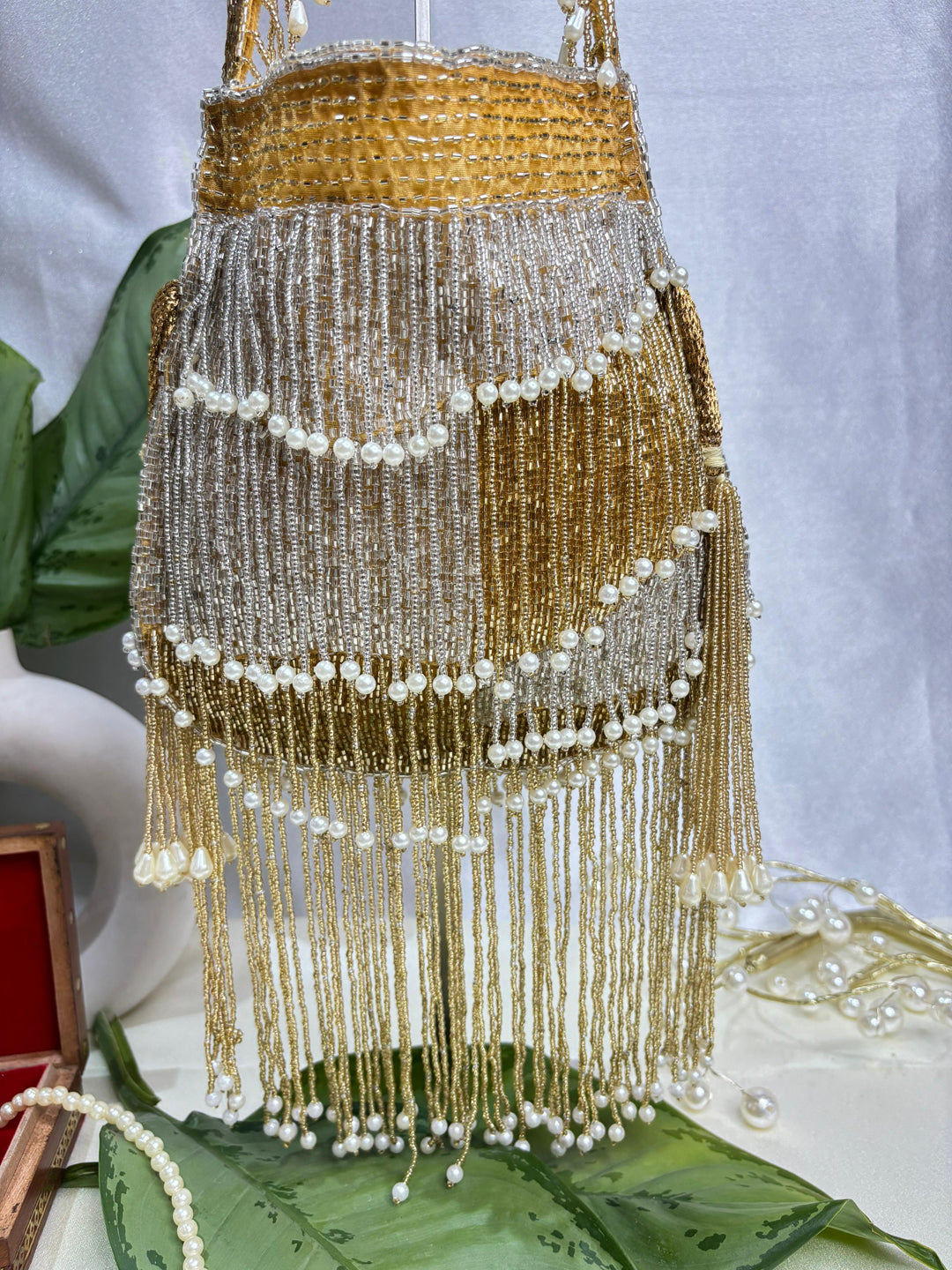 Naomi gold and silver multi layer pearl latkan potli