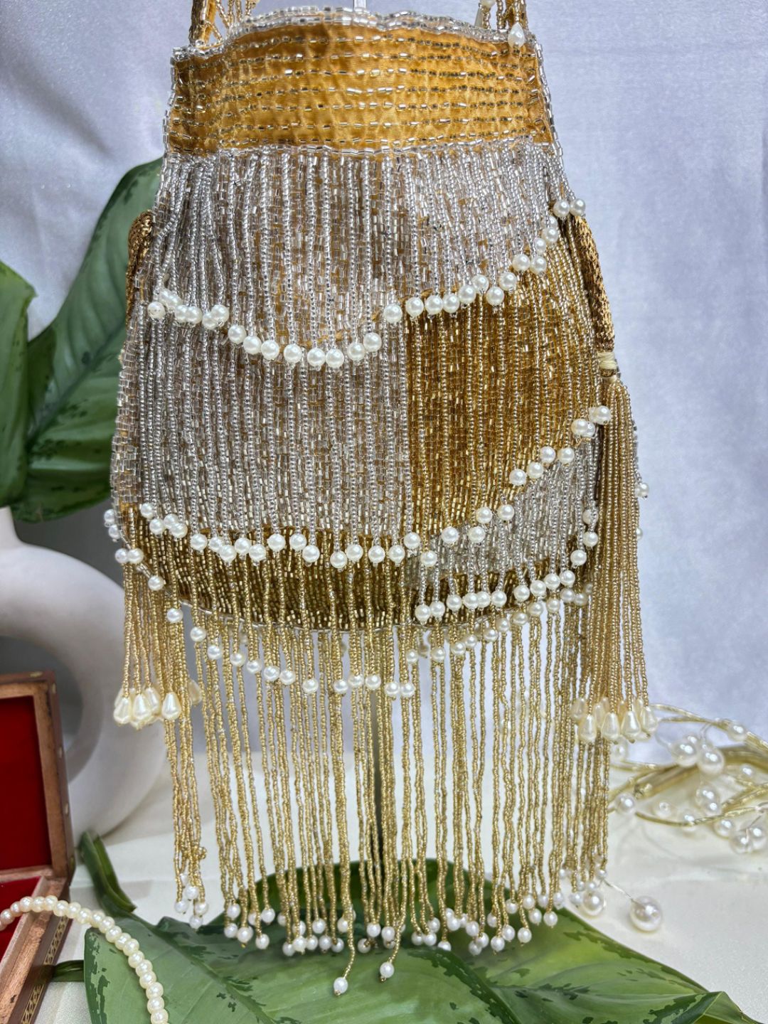 Naomi gold and silver multi layer pearl latkan potli