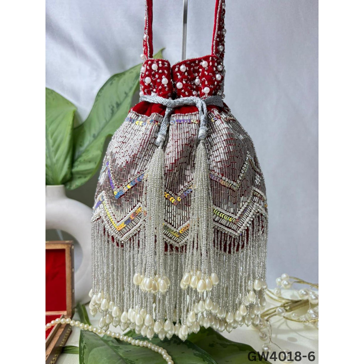 Designer Party Potli Bag for Women with Silver Tassels
