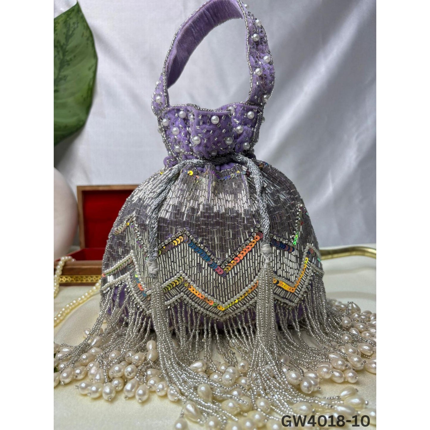 Designer Party Potli Bag for Women with Silver Tassels