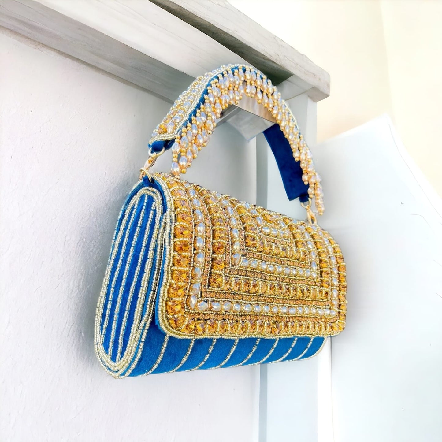 A crystal flap clutch