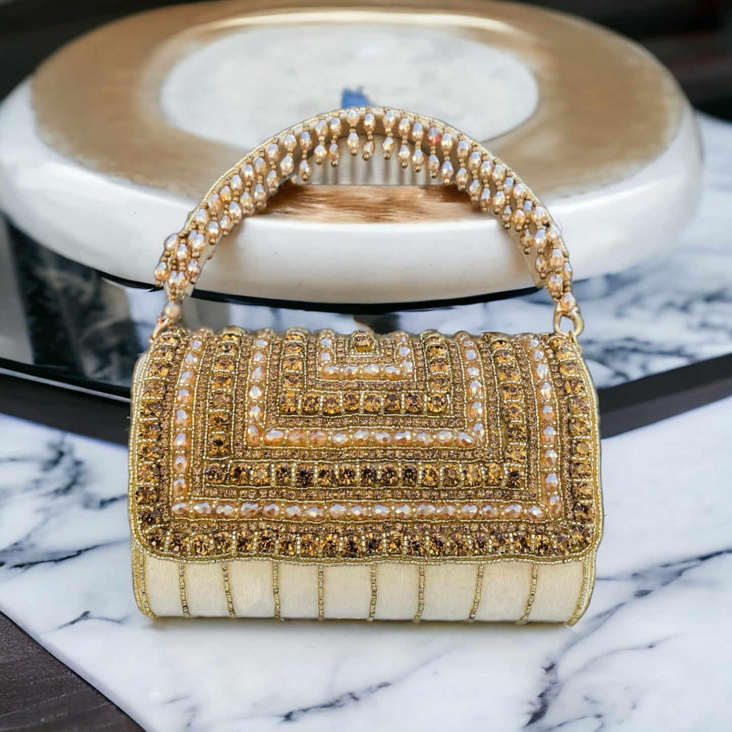 A crystal flap clutch