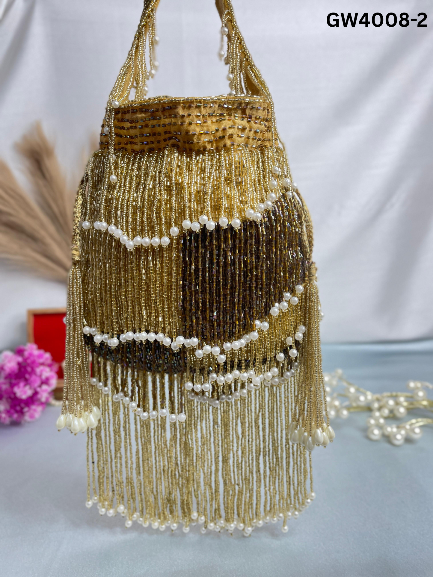 Naomi gold and silver multi layer pearl latkan potli