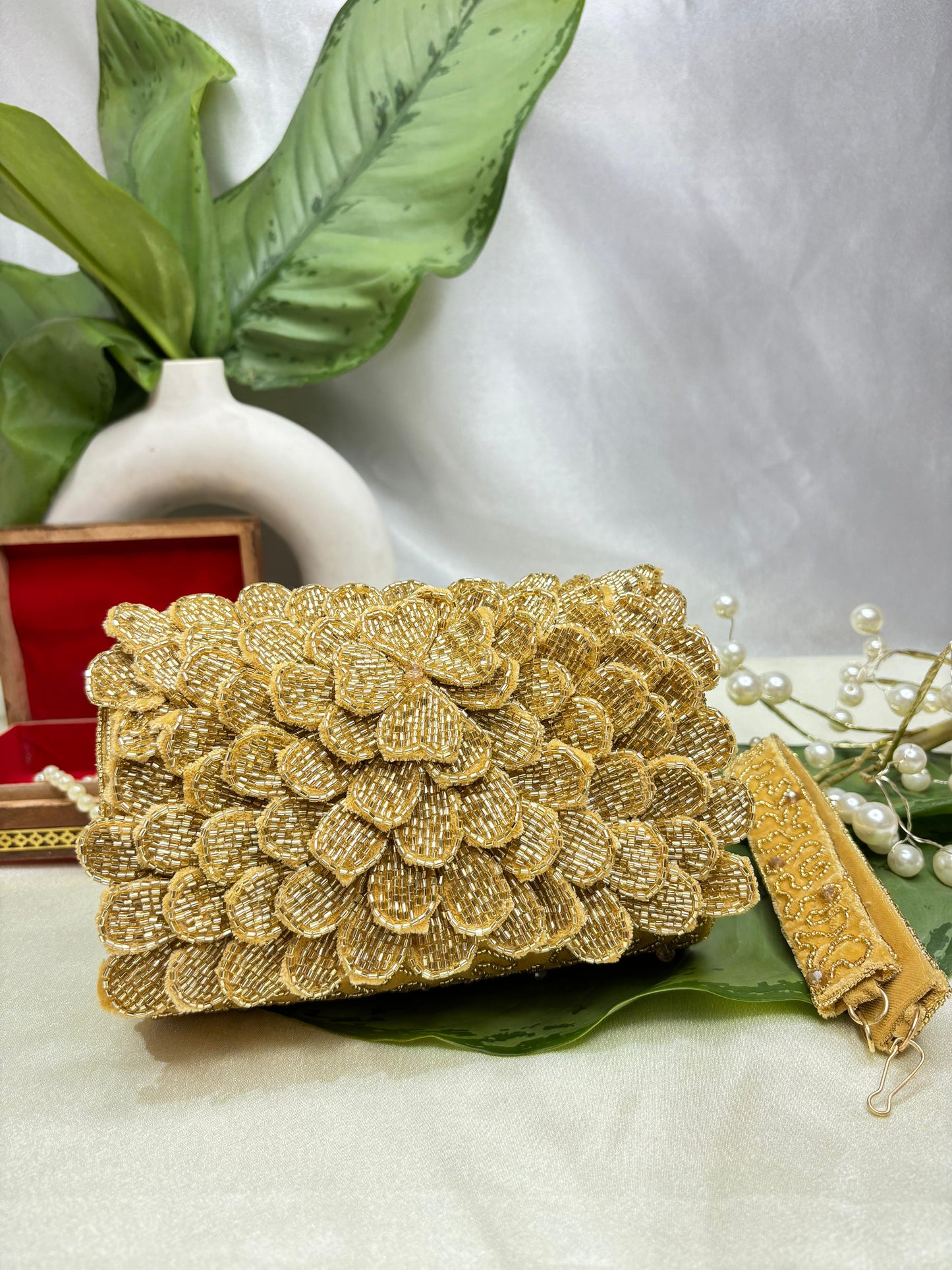 A Handcrafted Nalki Work clutch Bag – Elegant Floral Design