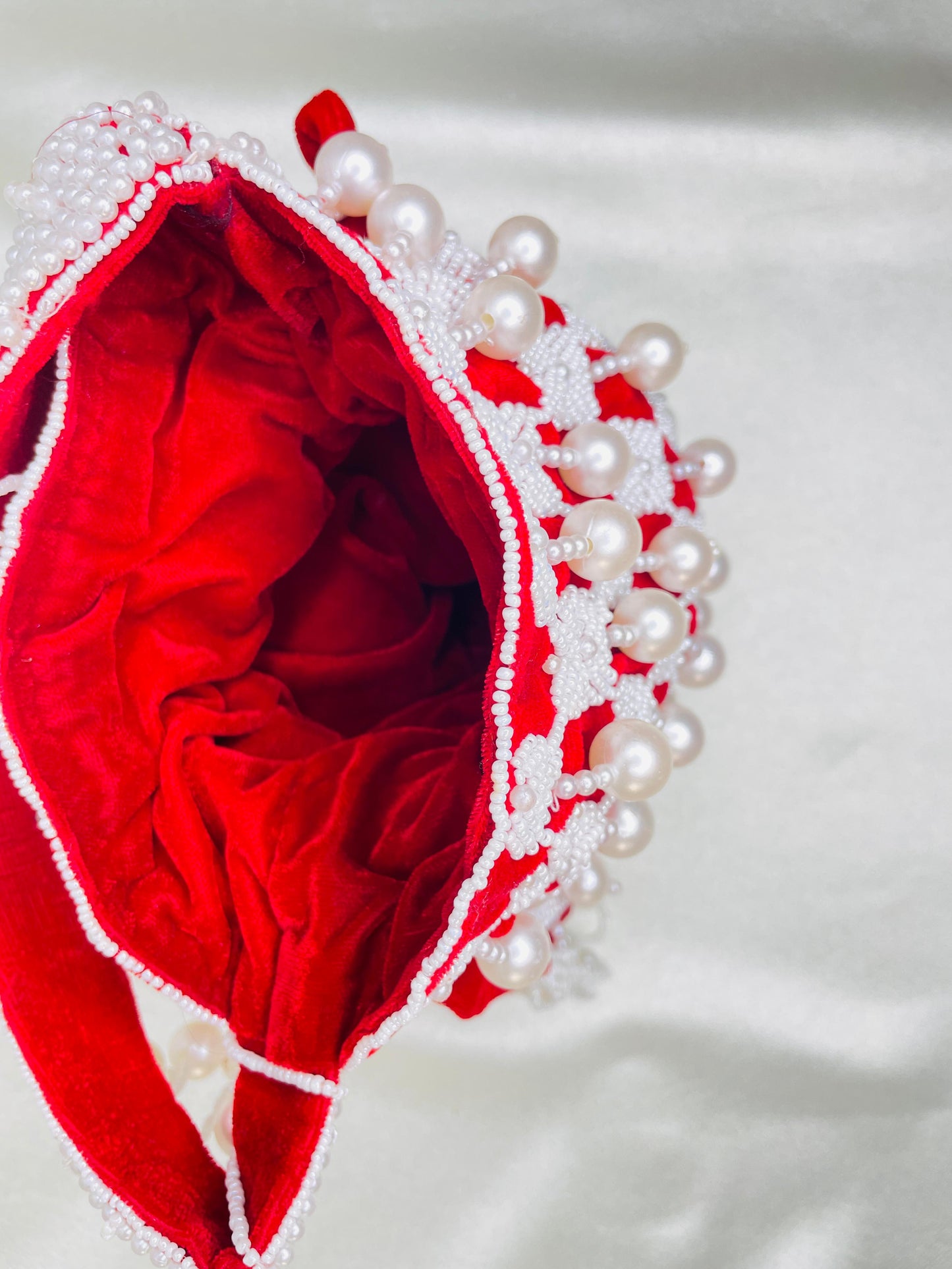 Sophie red pearl flowers potli