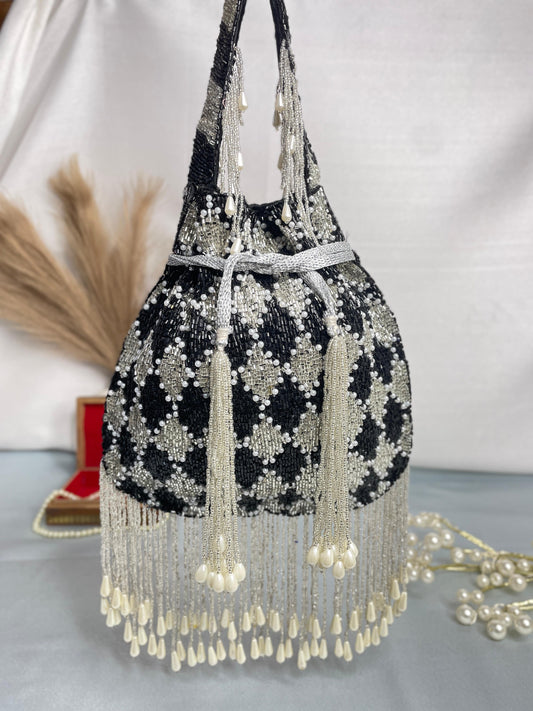 Elena gold and silver handwork potli