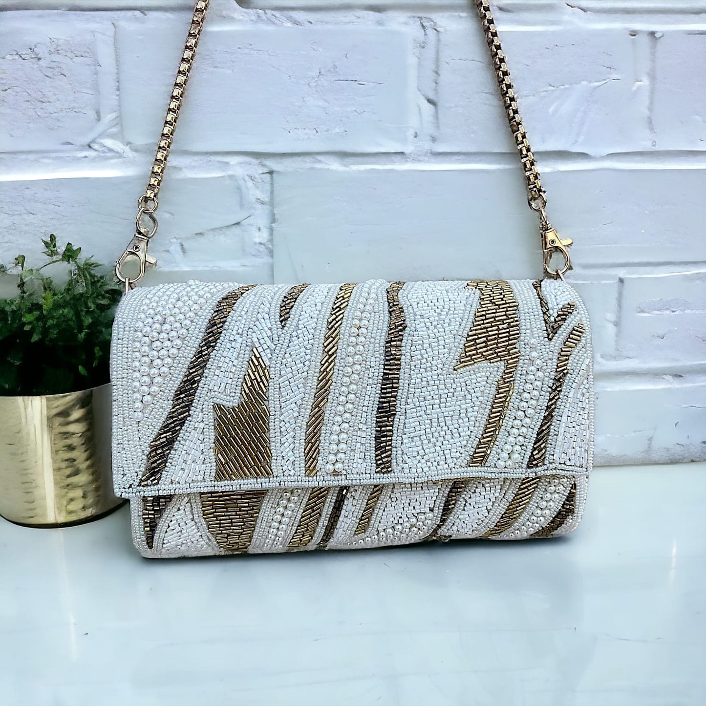 ZIANA CUTDANA PINK flap clutch