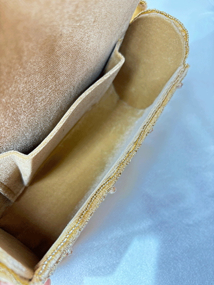 A Handcrafted Nalki Work clutch Bag – Elegant Floral Design