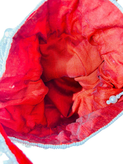 Handcrafted Nalki Work Potli Bag – Elegant Floral Design