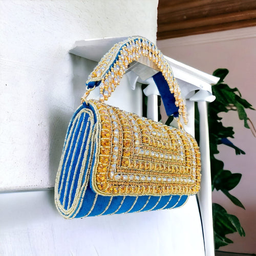 A crystal flap clutch