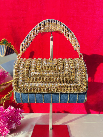 A crystal flap clutch