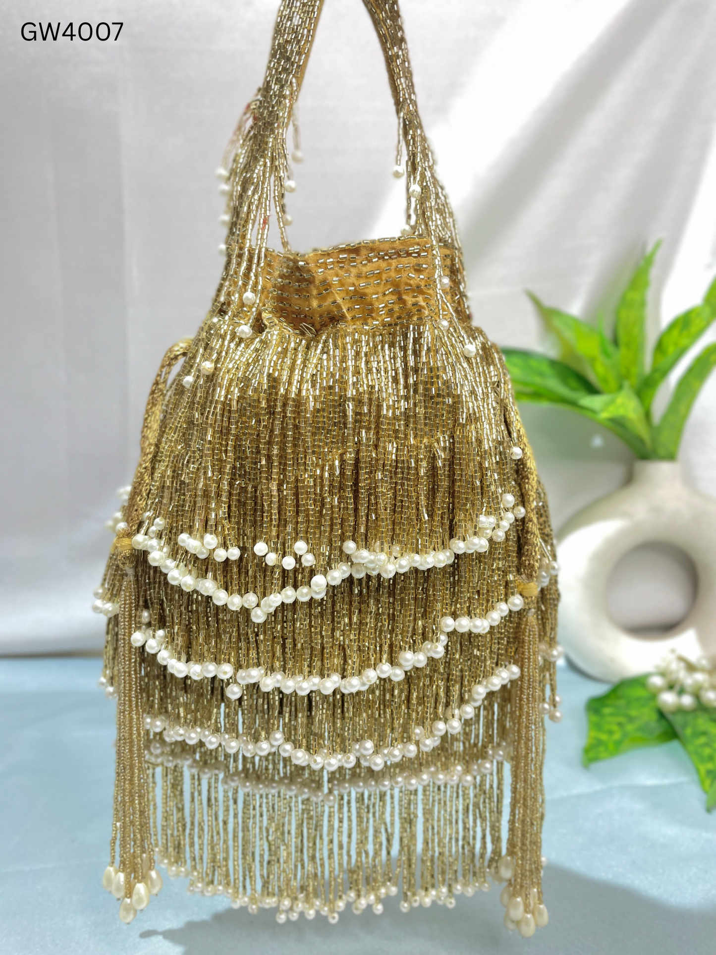 Naomi gold multi layer pearl latkan potli