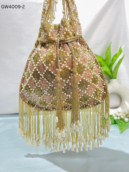 Elena gold and silver handwork potli