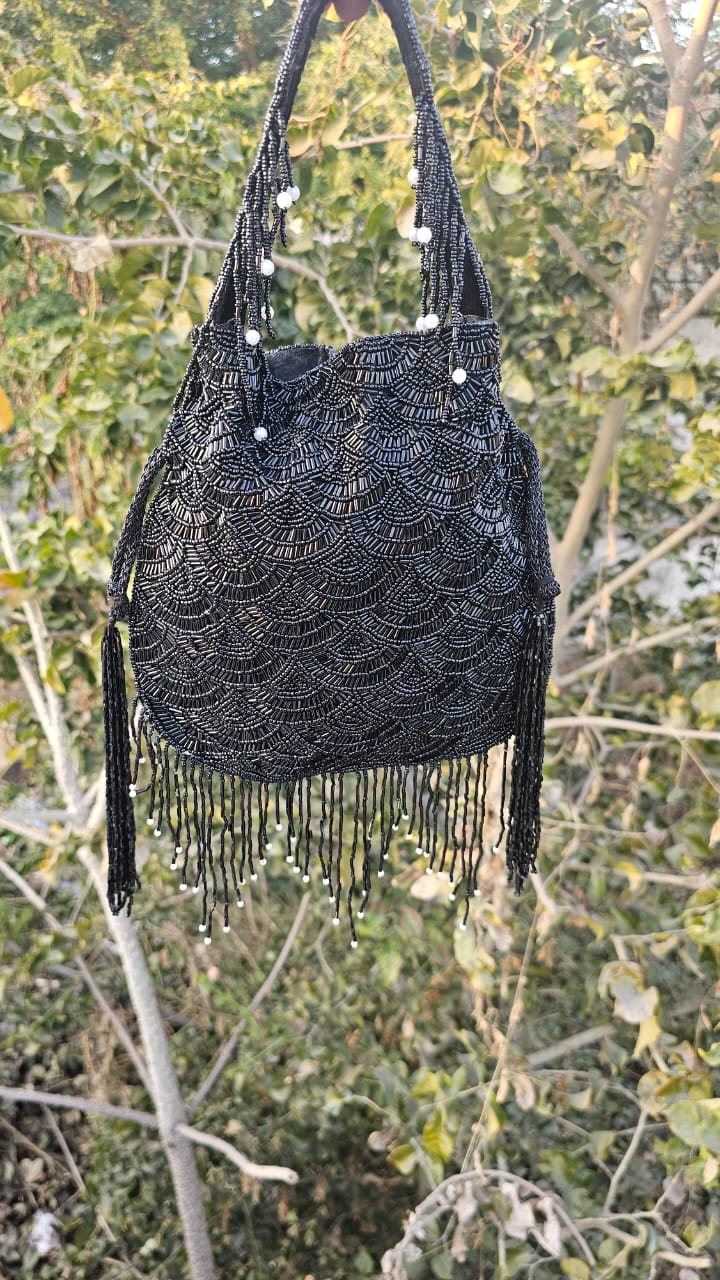 Olivia golden nalki work potli gold