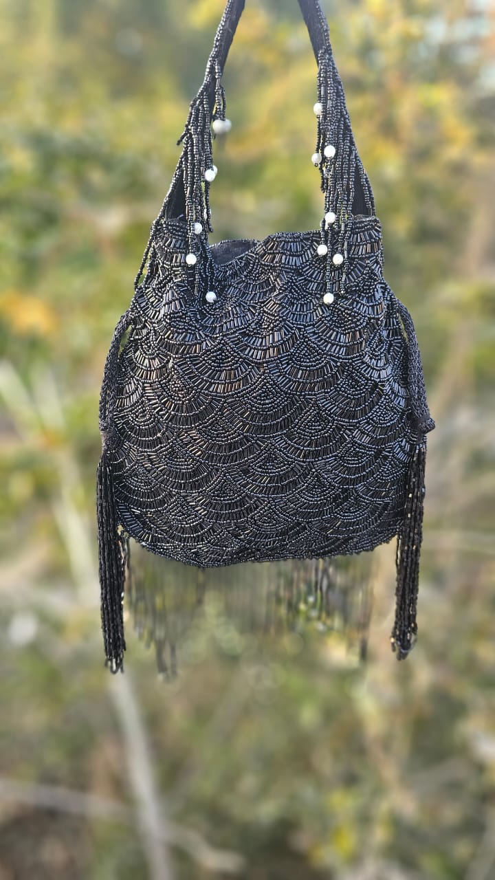 Olivia golden nalki work potli gold