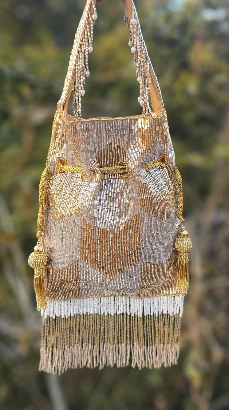 Ellie gold silver nalki work potli