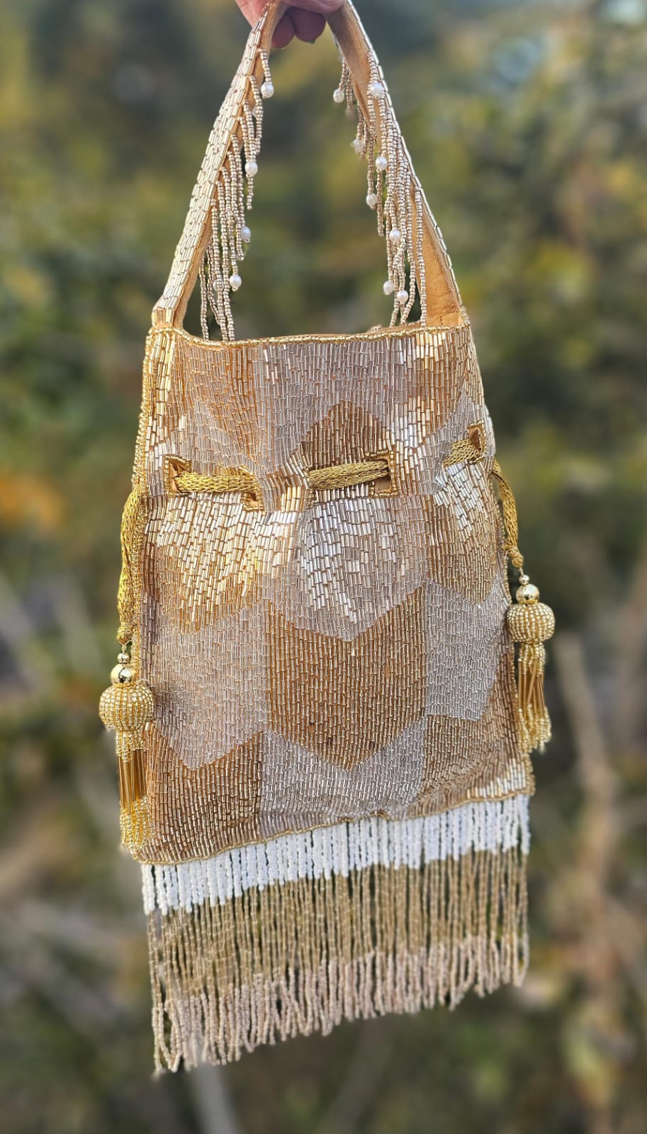 Ellie gold silver nalki work potli