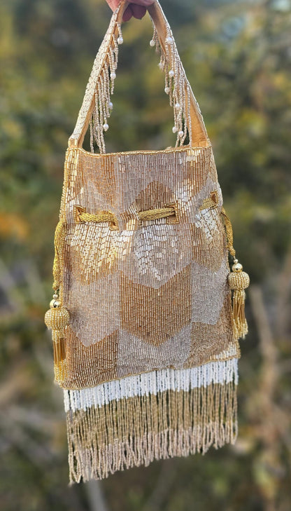 Ellie gold silver nalki work potli