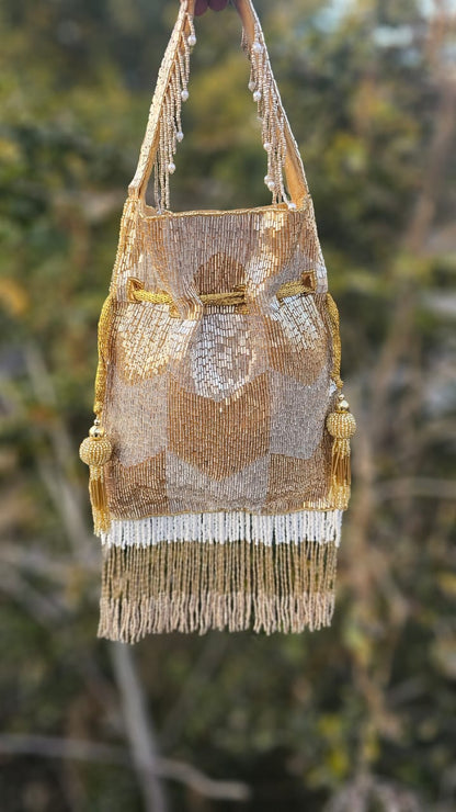 Ellie gold silver nalki work potli