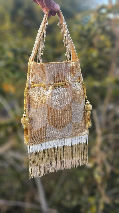 Ellie gold silver nalki work potli