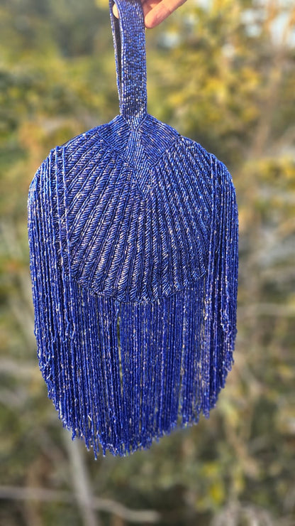 Gold Beaded Fringe Clutch with playful tassels and hidden button closure