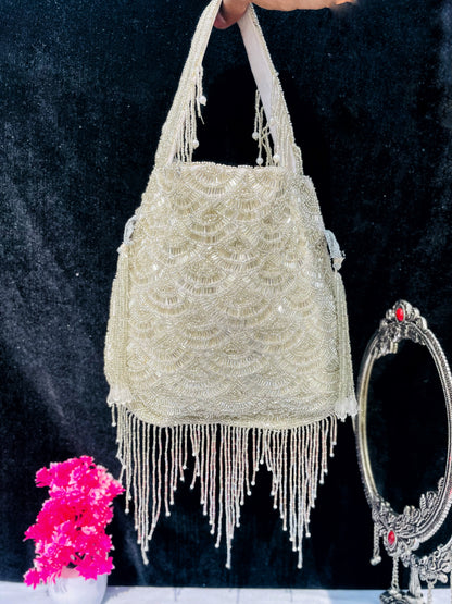 Olivia golden nalki work potli gold