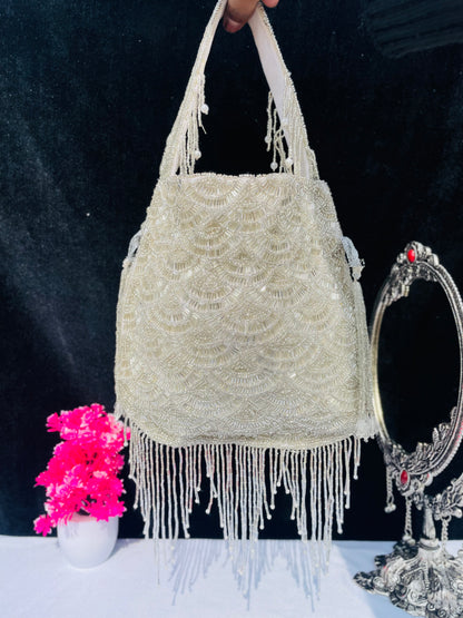 Olivia golden nalki work potli gold