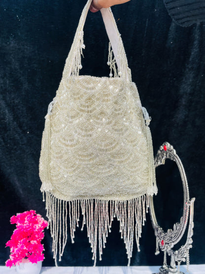 Olivia golden nalki work potli gold