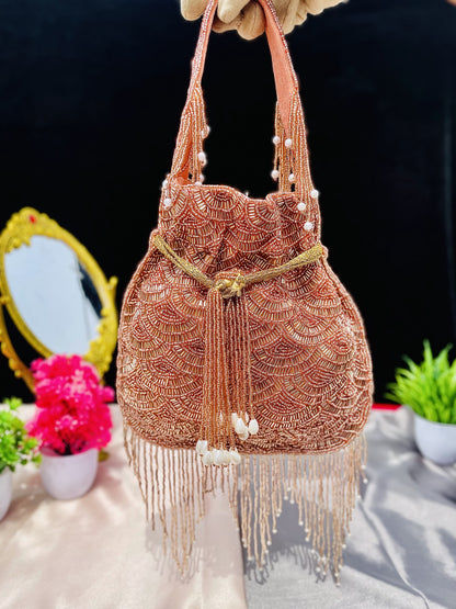 Olivia golden nalki work potli gold