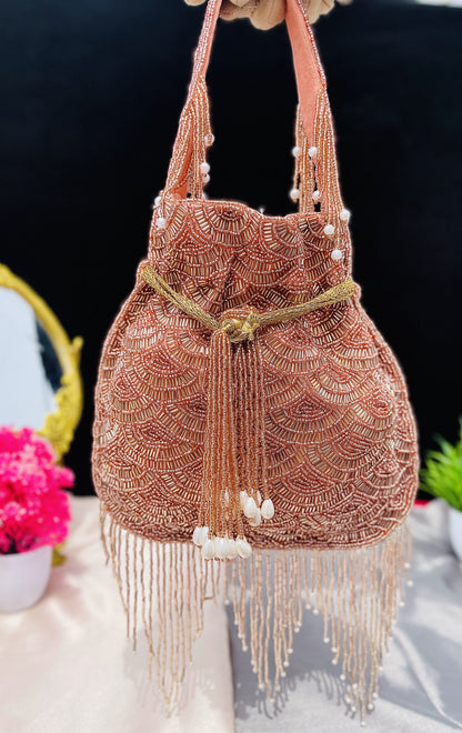 Olivia golden nalki work potli gold