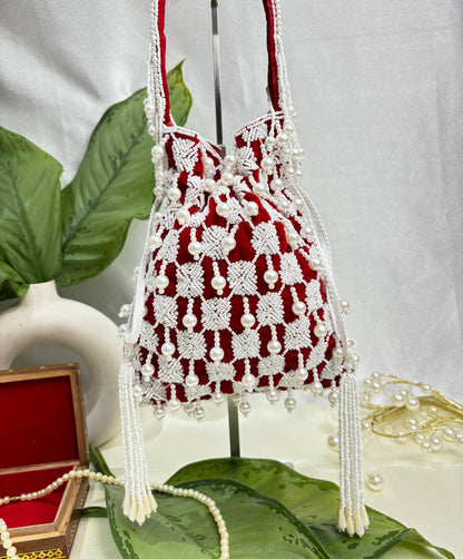 Handcrafted Nalki Work Potli Bag – Elegant Floral Design