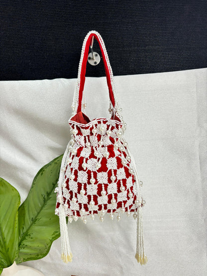Handcrafted Nalki Work Potli Bag – Elegant Floral Design