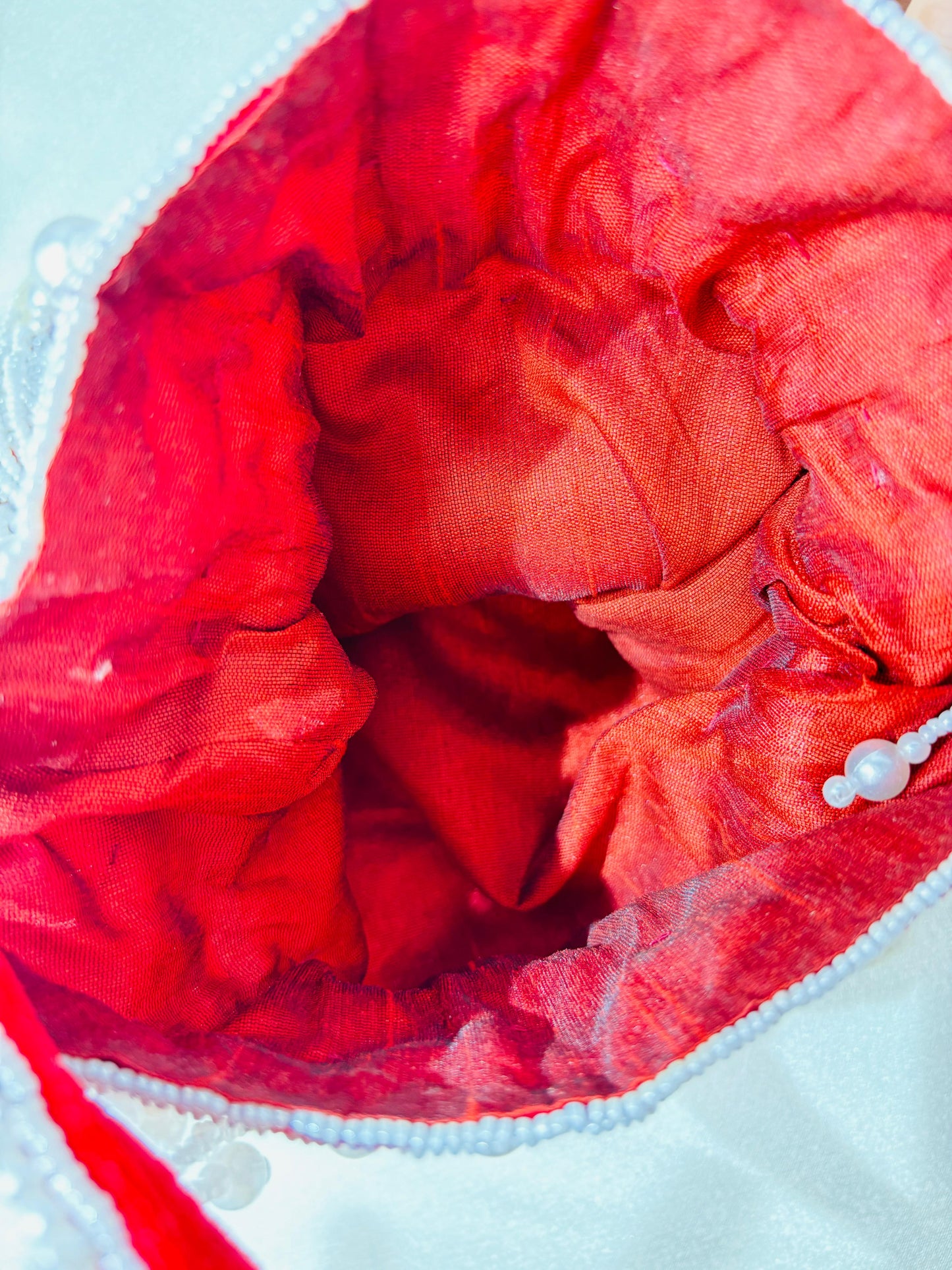 Handcrafted Nalki Work Potli Bag – Elegant Floral Design