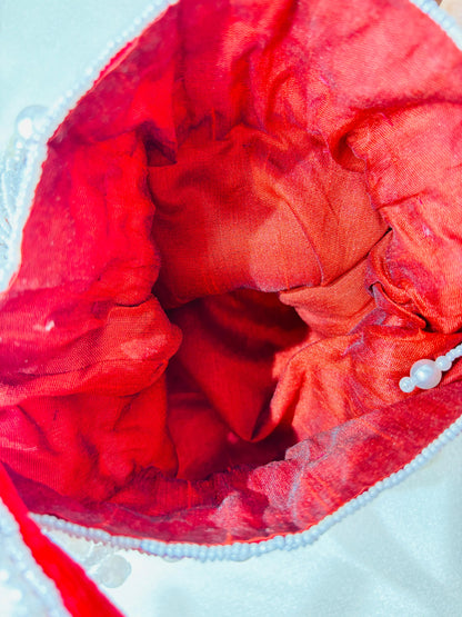 Handcrafted Nalki Work Potli Bag – Elegant Floral Design