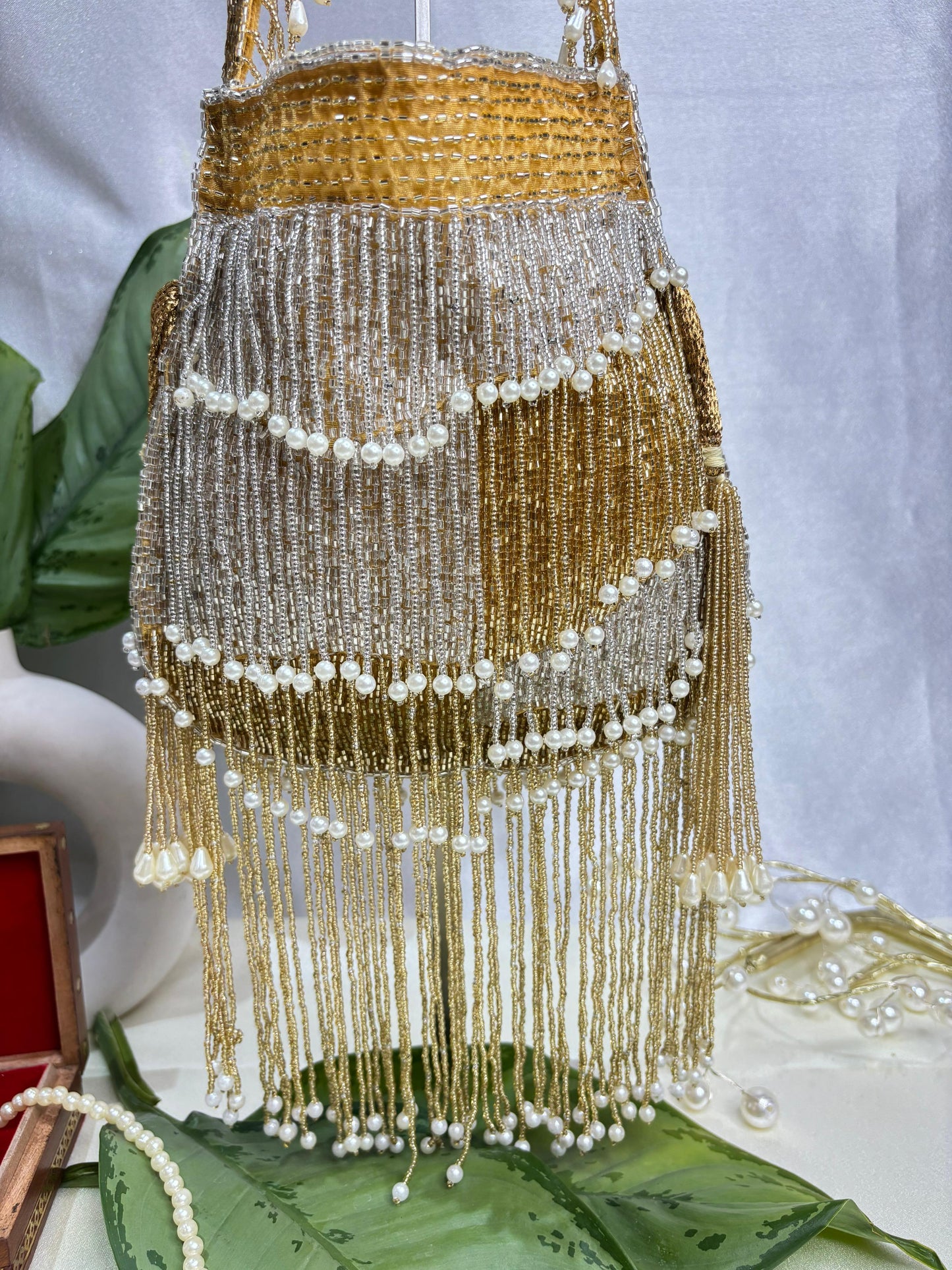 Naomi gold and silver multi layer pearl latkan potli