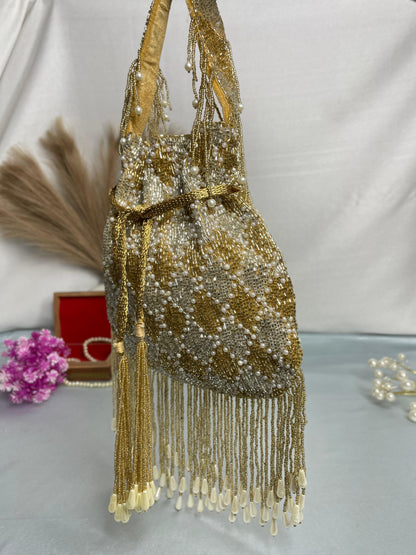 Elena gold and silver handwork potli
