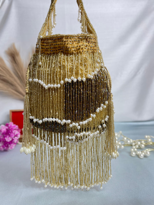 Naomi gold and silver multi layer pearl latkan potli