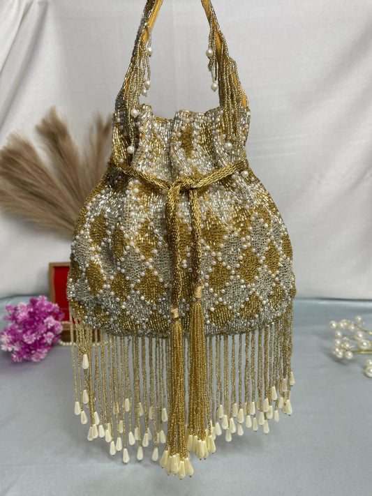 Elena gold and silver handwork potli