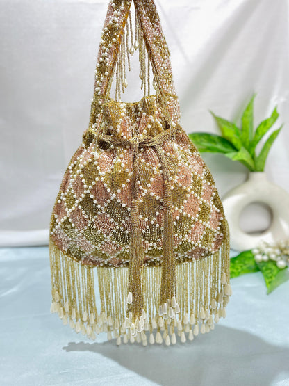 Elena gold and silver handwork potli