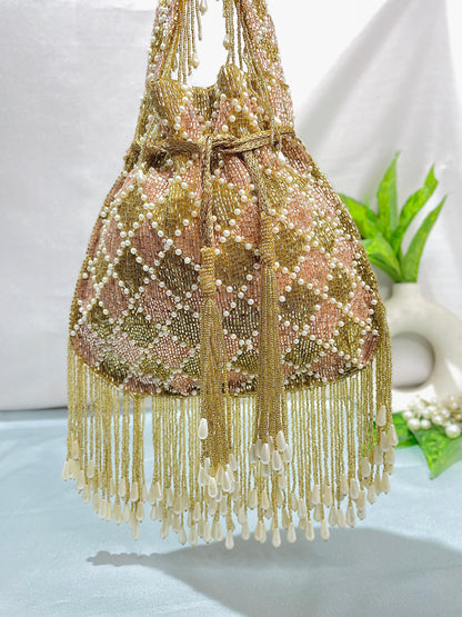 Elena gold and silver handwork potli