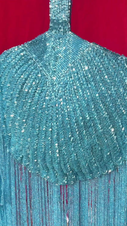 Gold Beaded Fringe Clutch with playful tassels and hidden button closure