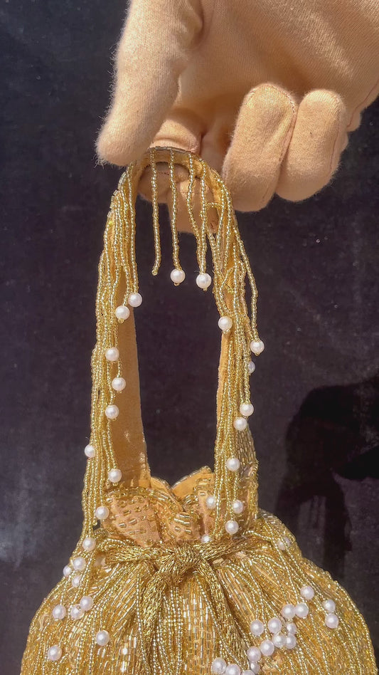 Naomi gold multi layer pearl latkan potli