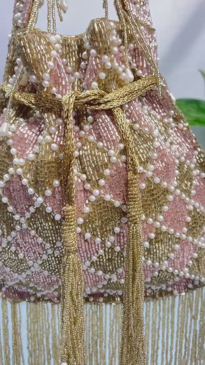 Elena gold and silver handwork potli