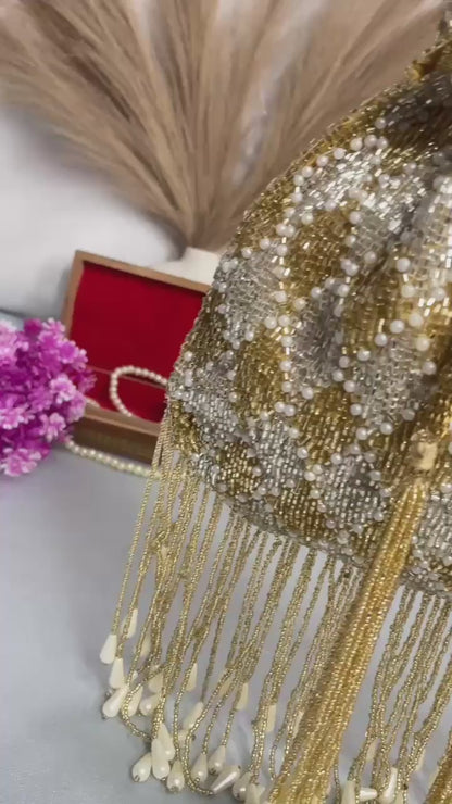 Elena gold and silver handwork potli