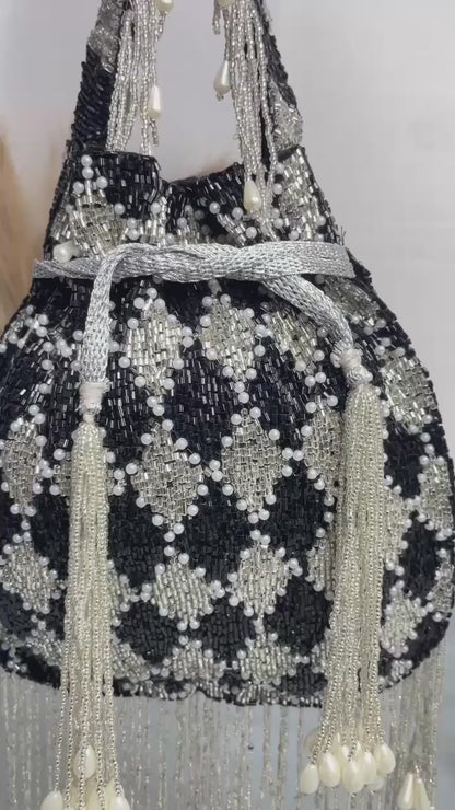 Elena gold and silver handwork potli